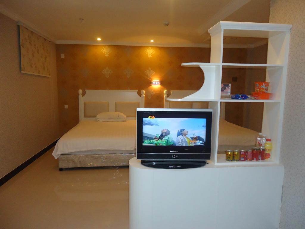 Omeiga Business Hotel Yiwu (Zhejiang) Habitación foto
